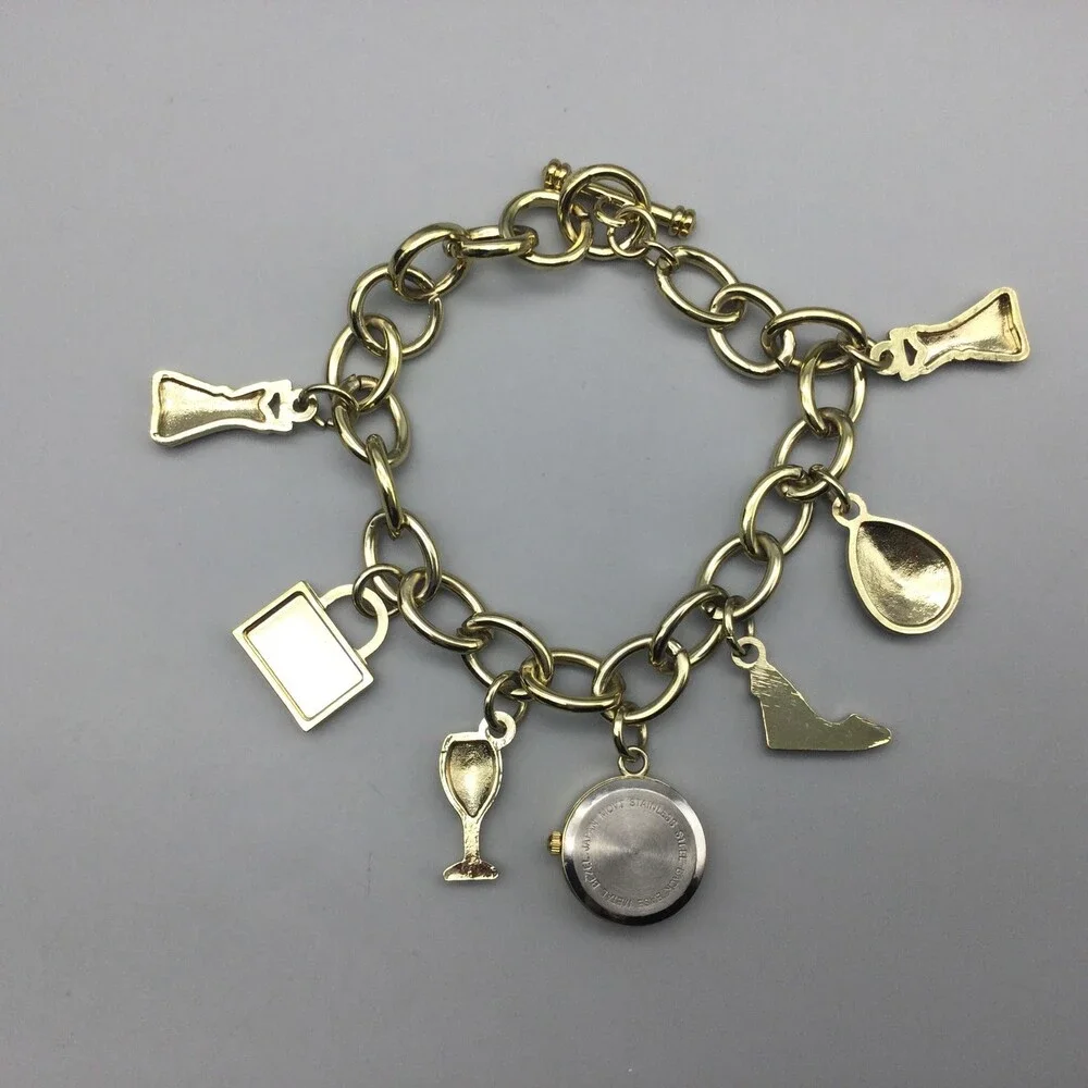 Gold Tone Charm Bracelet Womens Watch 8